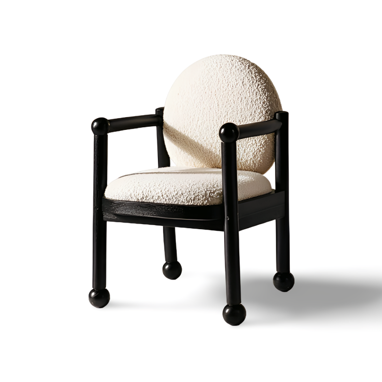 Orbis Accent Chair by Dezaro featuring a sculptural upholstered design with a handcrafted wooden frame for modern luxury interiors