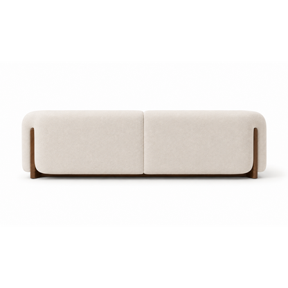 Modern Alba Bouclé Sofa designed with rounded arms and exposed walnut wood supports